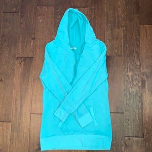 Turquoise hoodie.